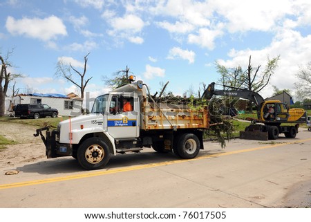 SAINT LOUIS, MISSOURI - APRIL 22: Areas of St. Louis undergo clean up efforts after tornadoes hit the Saint Louis, Missouri area on Friday, April 22, 2011.