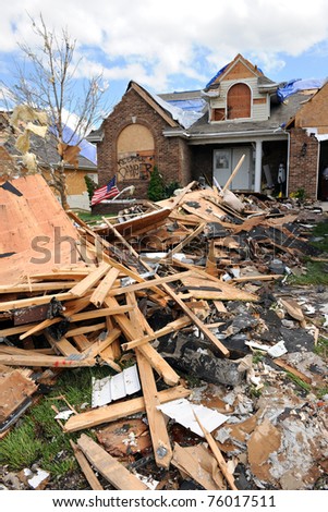 SAINT LOUIS, MISSOURI - APRIL 22: Debris from destroyed homes and property is strewn across areas of St. Louis, Missouri after tornadoes hit the Saint Louis area on Friday, April 22, 2011.