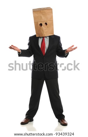 Portrait of businessman wearing paper bag over head isolated over white background