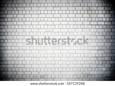 Dark gray brickwall surface for usage as a background