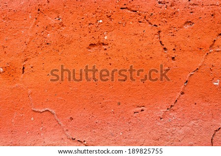 Scratched orange surface for background usage