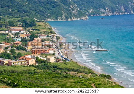 Typical bay with little town Arillas on Corfu, Greece