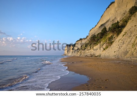 Beach and steep cliffs near Agios Stefanos - Corfu island, Greece