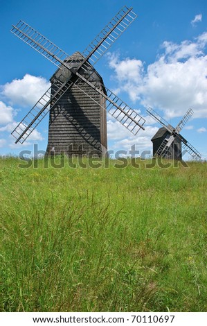Two windmills during the summer