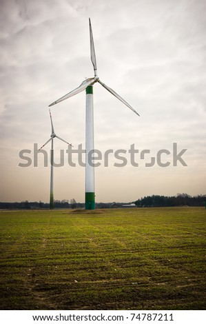 Dramatic scene with two windmills