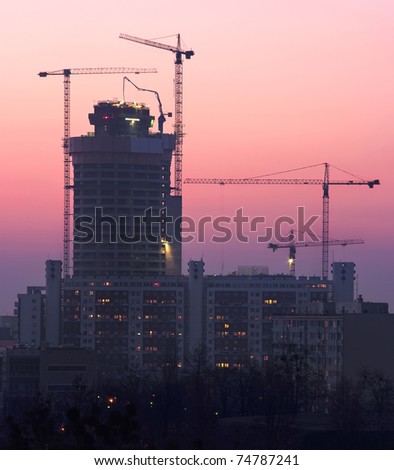 Sky Tower building and cranes in Wroclaw, Poland