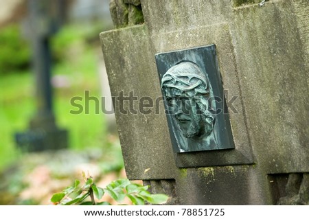 Christ relief on old grave