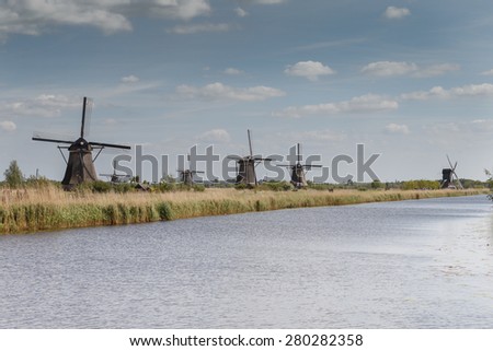 Kinderdijk Netherlands May 2015, old windmills standing in a typical Dutch landscape