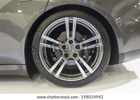 BANGKOK - APRIL 2: Porsche wheel on display at The 35th Bangkok International Motor Show on April 2, 2014 in Bangkok, Thailand.