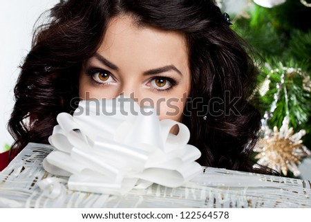 beautiful fashionable woman with gift boxes