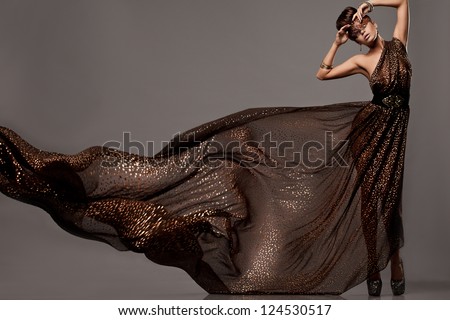 Beautiful Woman In Brown Dress