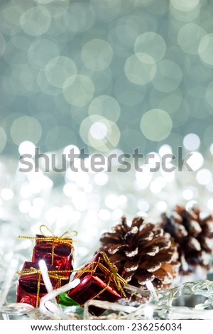Christmas gift box on sparkles background