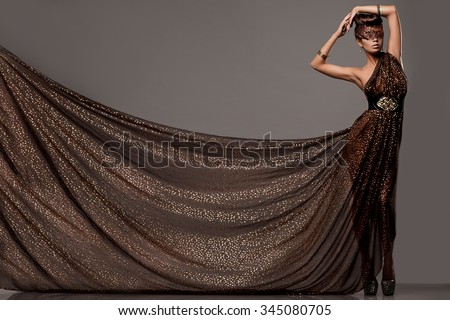 beautiful woman in brown dress