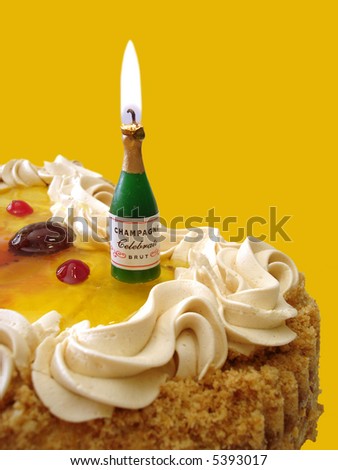 stock-photo-birthday-cake-with-candle-on-yellow-background-bottle-with-champagne-5393017.jpg