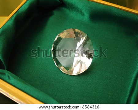 Beautiful diamond crystal on green box