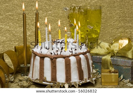 birthday table with cake and candles