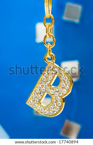 diamond letter B on blue background