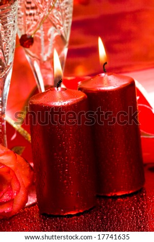 celebration table, rose, candles and glasses with champagne