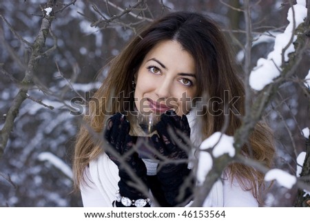 Beautiful woman in the forest with a cup of tea