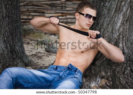 young bodybuilder man in street