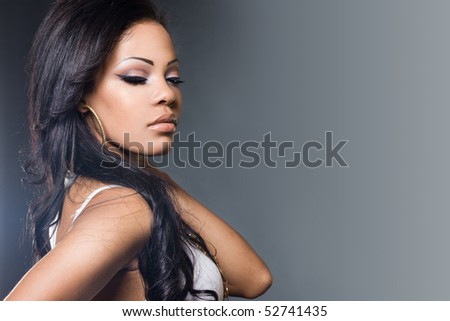 Sexy Fashionable Mulatto Woman In A T Shirt Stock Photo
