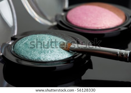 make-up eyeshadows and cosmetic brush