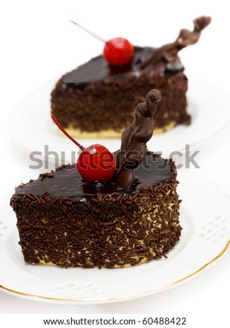 chocolate cakes with red cherry