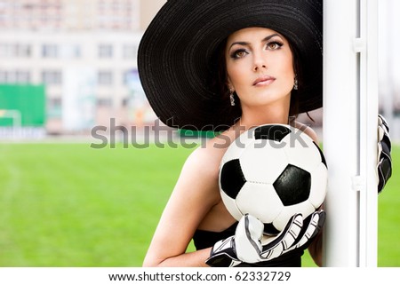 Elegant woman with Football ball