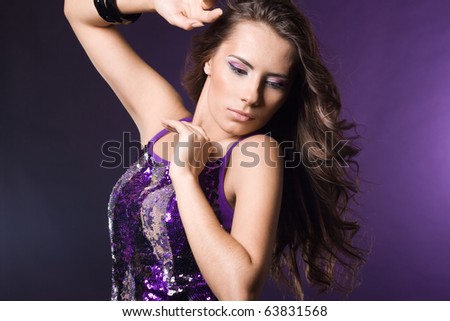 fashionable woman in violet dress
