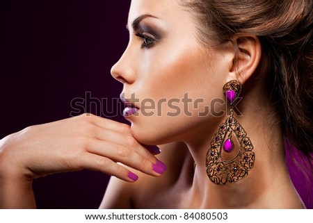 Lifestyle Stock-photo-elegant-fashionable-woman-with-violet-jewelry-84080503