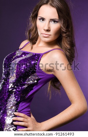 fashionable woman in violet dress