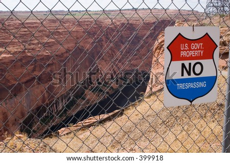 Government sign and fence blocks access to the river canyon near Glen Canyon Dam/Lake Powell
