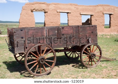 Authentic covered wagon, partially restored, on the grounds of old Fort Union National Monument, north of Santa Fe, New Mexico.