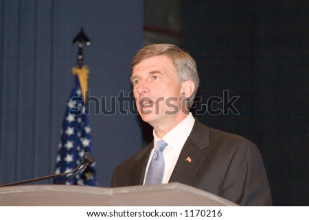 Former space shuttle astronaut Dr. Ron Sega, Under Secretary of the Air Force, informal profile head and shoulders shot speaking at the 22nd Annual Space Symposium in Colorado Springs, April, 2006.