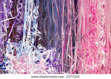 Bright ribbons on display in a vendor\'s booth at a festival for backgrounds