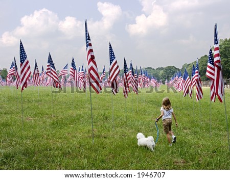 Young Girl and Dog in Field of Flags