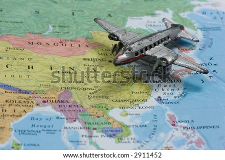 Toy Airplane on Map of China.  Shallow depth of field from use of macro lens