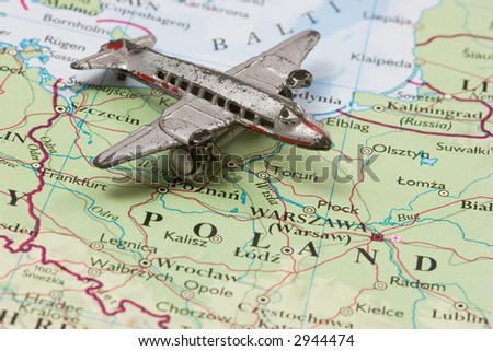 Toy Airplane on map of Poland.  Shallow depth of field from use of macro lens