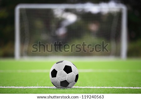 soccer ball on green grass soccer ball on green grass