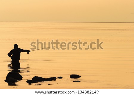 Sea flyfishing in the sunset