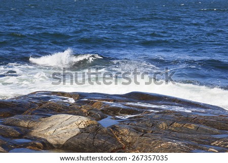 Waves rolling into the rocks
