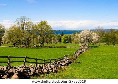 Beautiful stone wall in a spring landscape