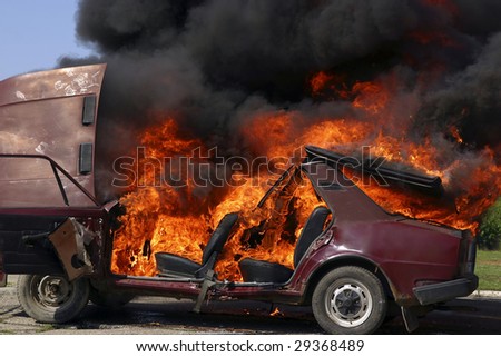Exploded parking car on fire