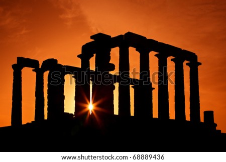 The Temple of Poseidon (ancient God of the Sea), at cape Sounion, at sunset, close to Athens, Attica, Greece