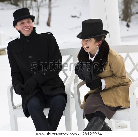 Man and woman laugh over some silly joke
