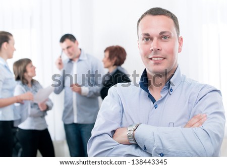 Successful man being leader of a business group