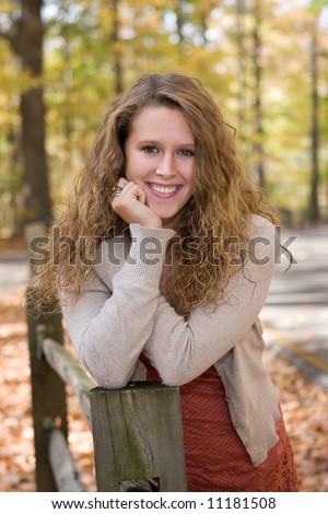 Senior portrait of beautiful high school senior girl at Mounds Park, Anderson, IN.