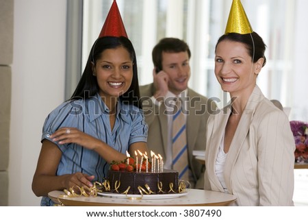 Two women at office party