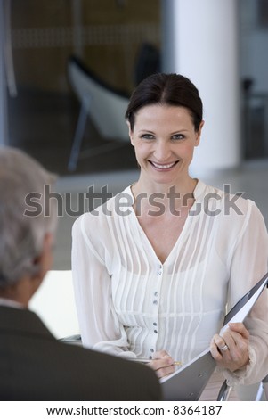 Woman consultant sitting in front of a client