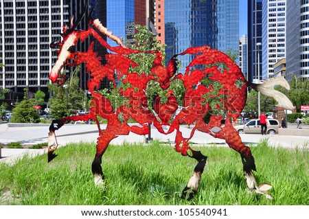 CALGARY, CANADA - JUNE 7 : Galloping horses art installation on June 7, 2012 in Calgary, Alberta Canada. The installation is in a new urban park in Calgary\'s financial district.